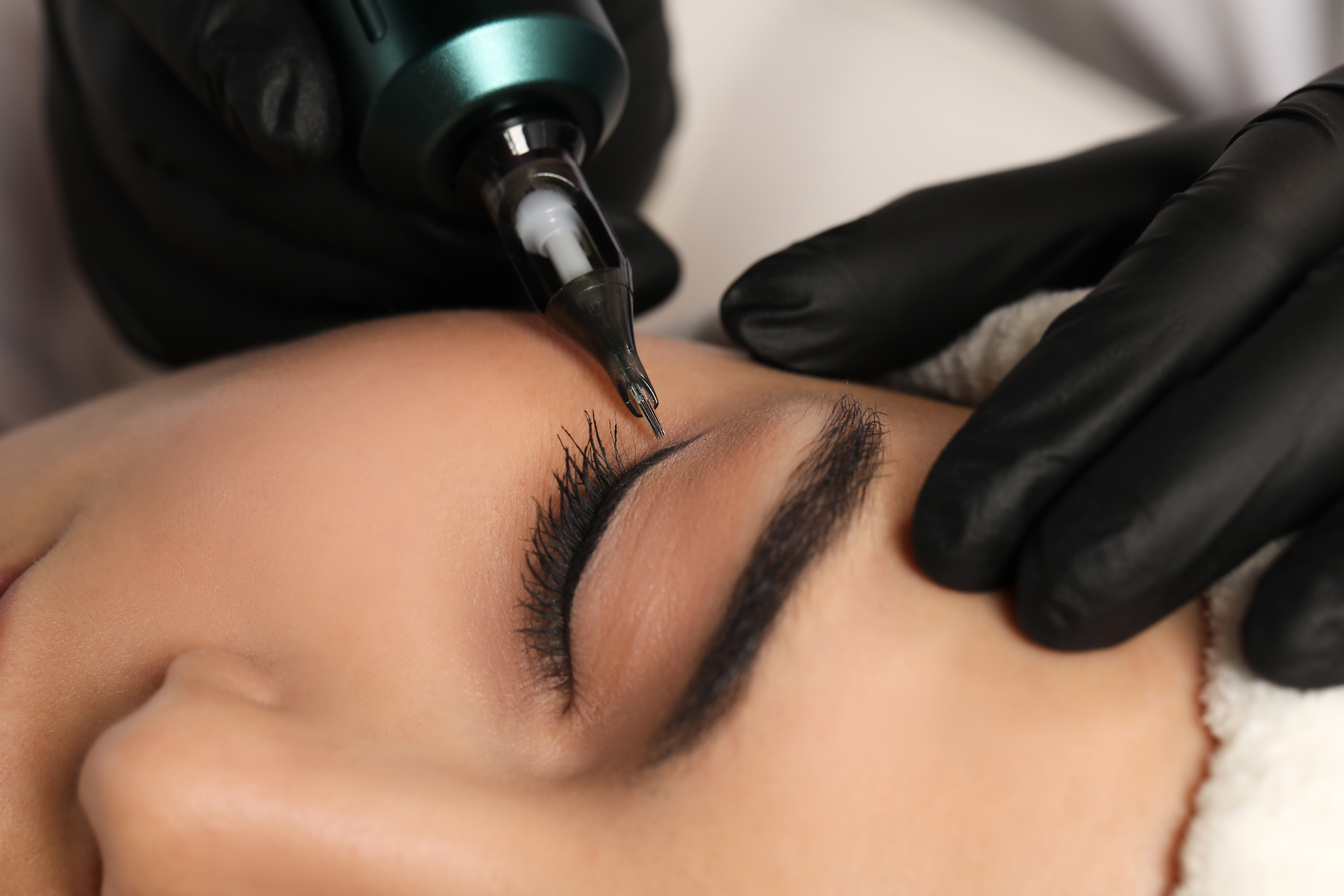 Young Woman Undergoing Procedure of Permanent Eyeliner Makeup, C